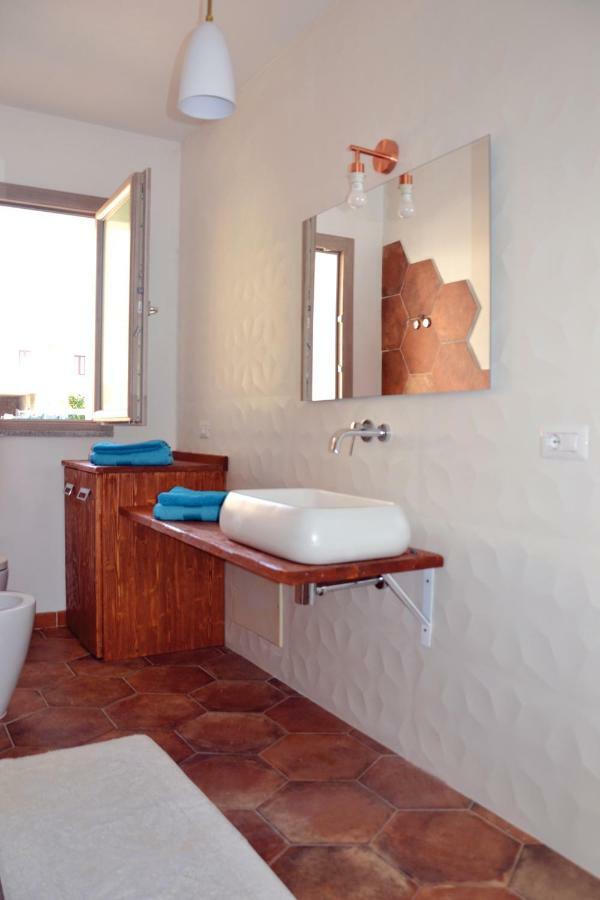 Apartamento Le Perle Dell'Isola Isola Rossa Exterior foto