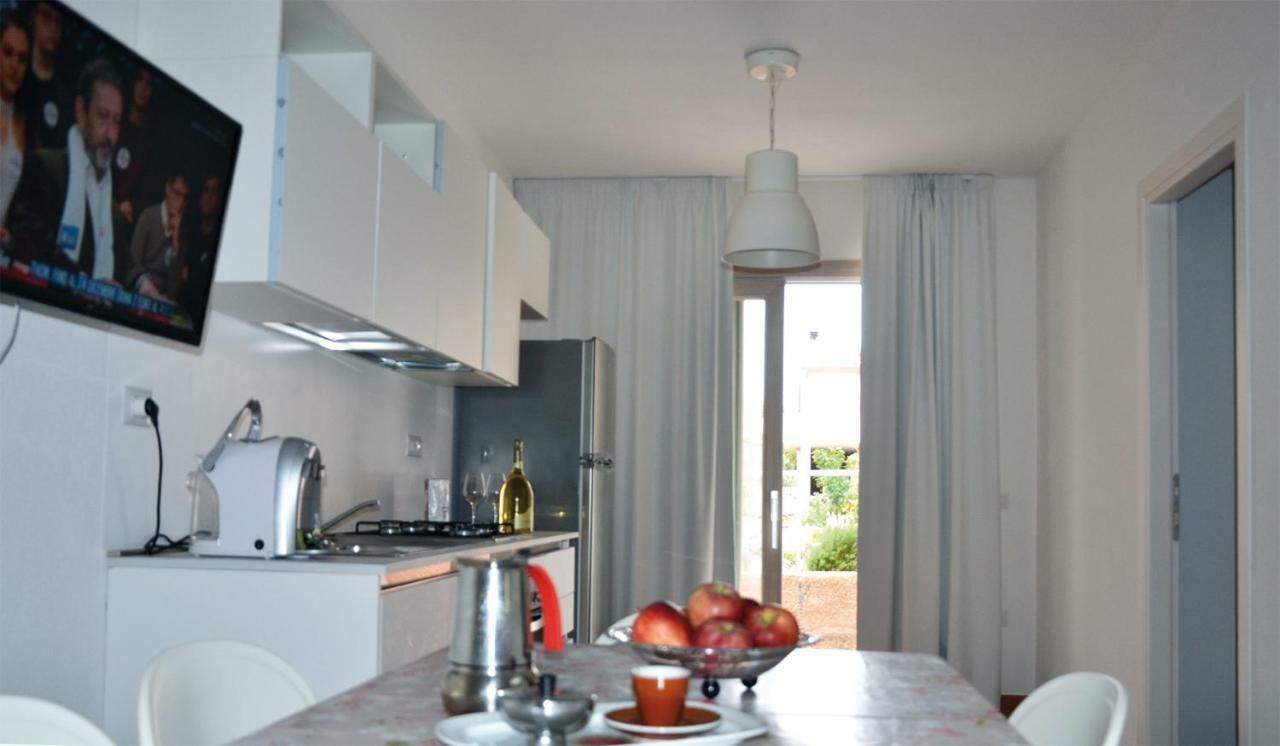Apartamento Le Perle Dell'Isola Isola Rossa Exterior foto