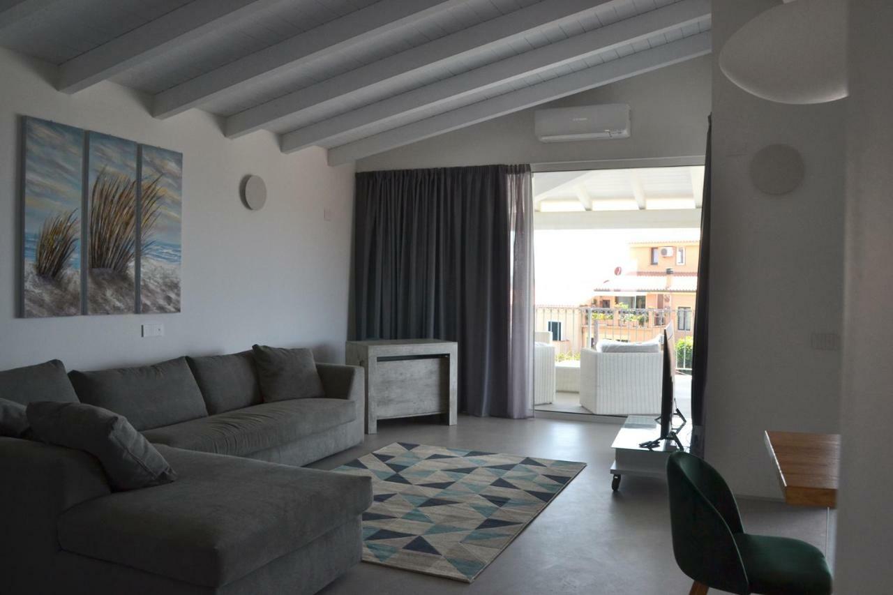 Apartamento Le Perle Dell'Isola Isola Rossa Exterior foto